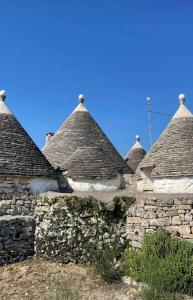 Photo de la galerie de l'établissement Trullo Antico con piscina indipendente - Trulli Finisterrae, à Ceglie Messapica 43 autres photos