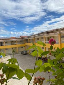 a view of a building with a parking lot at Portal do Sol in Itaberaba