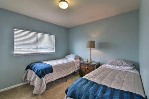 a bedroom with two beds and a window at City Retreat- NRG & Downtown and Medical Center in Houston