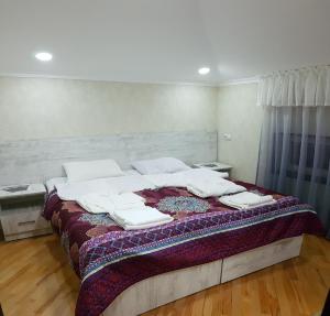 Postel nebo postele na pokoji v ubytování GUEST HOUSE 15A