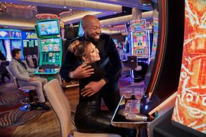 a man and a woman hugging in a casino at SAHARA Las Vegas in Las Vegas