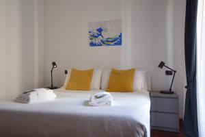 Tempat tidur dalam kamar di Padova Business Luxury Terrace