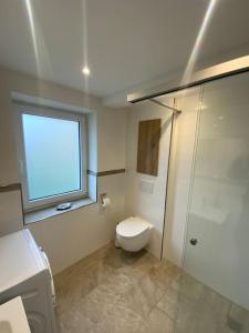 Koupelna v ubytování Ferienwohnung Weitblick + 3 fotografie