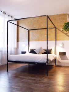 Postel nebo postele na pokoji v ubytování Domus 19