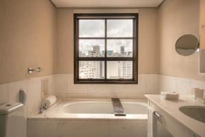 Um banheiro em Hotel Fasano Sao Paulo