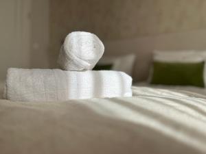 A bed or beds in a room at University city life Bestern