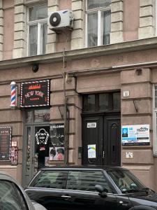 a car parked in front of a building at Dolce Vita Budapest in Budapest
