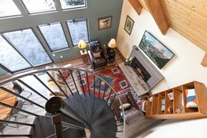an overhead view of a spiral staircase in a house at The Fishermans Place Peaceful with Mountain Views in Breckenridge
