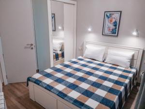 Postel nebo postele na pokoji v ubytování New Gudauri Twins by Gudauri Travel