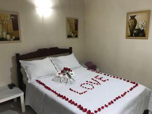 Cama ou camas em um quarto em Pousada Cabanas da Serra Lumiar