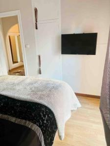 Telewizja i/lub zestaw kina domowego w obiekcie Apartamento a 2 min de playa