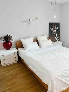 Łóżko lub łóżka w pokoju w obiekcie Apartamento a 2 min de playa