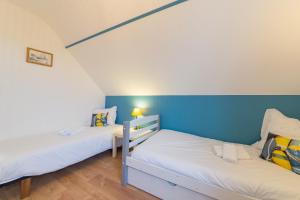 Postel nebo postele na pokoji v ubytování KER HELEN - Maison familiale vue mer