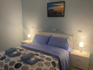 Postel nebo postele na pokoji v ubytování Civita Home