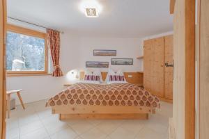 Letto o letti in una camera di Chalet Hinterstein