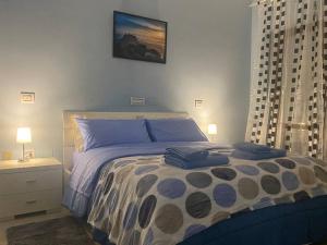 Postel nebo postele na pokoji v ubytování Civita Home