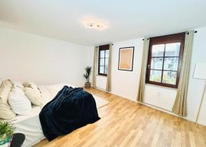 Ένα ή περισσότερα κρεβάτια σε δωμάτιο στο MA City Centre Apart.(Free Parking/Internet/1BR)