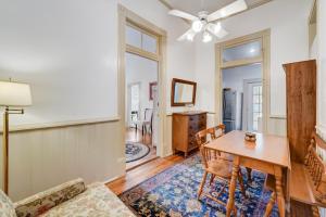 a living room with a table and a dining room at Little Lavaca #1 in San Antonio