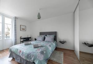 Postel nebo postele na pokoji v ubytování Appartement design La Petite Europe - Idéal Curistes
