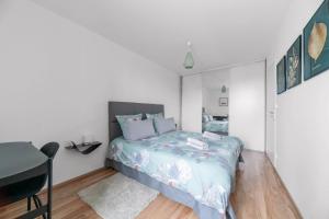 Postel nebo postele na pokoji v ubytování Appartement design La Petite Europe - Idéal Curistes