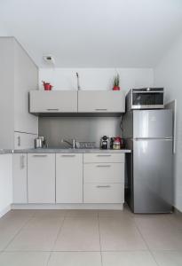Kuchyň nebo kuchyňský kout v ubytování Appartement design La Petite Europe - Idéal Curistes