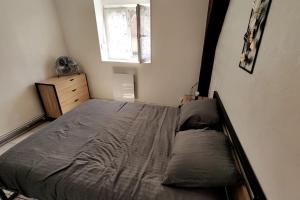 Posteľ alebo postele v izbe v ubytovaní Appartement style industriel au centre de Douai
