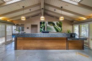 a large kitchen with a large counter in a house at Best Western PLUS Island Palms Hotel & Marina in San Diego