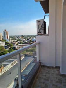 a balcony with a view of a city at Resistencia City Apartment in Resistencia