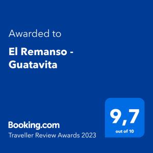 a blue screen with the text awarded to el reminiscanza guatemala at El Remanso-Guatavita, Casa Campestre Completa in Guatavita