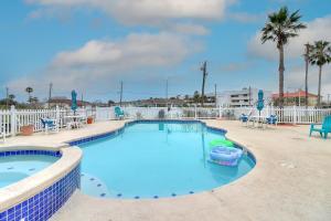 a large swimming pool with a toy boat in it at Fairways #204 in Padre Island