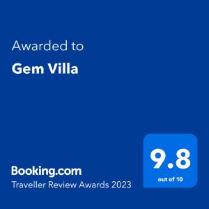 韋利格默的住宿－Gem Villa，蓝色的屏幕,文字被授予了格恩维利亚