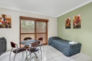 Area soggiorno di Western Gateway Motel and Apartments
