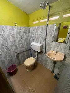 Koupelna v ubytování Ikhlas Roomstay