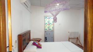 Letto o letti in una camera di Pidurangala View Home Stay
