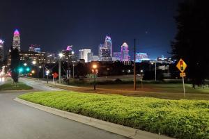 a view of a city skyline at night at Suite 4, Sleep 6, Walk to Attractions in Uptown in Charlotte