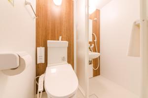 a bathroom with a white toilet and a sink at SyunkaSyuutou - Vacation STAY 53627v in Hakone