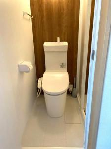 a bathroom with a white toilet in a room at SyunkaSyuutou - Vacation STAY 53638v in Hakone