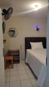 Ein Bett oder Betten in einem Zimmer der Unterkunft The Bloomy House