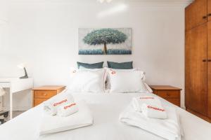 En eller flere senge i et værelse på Hopstays - Oporto Musica