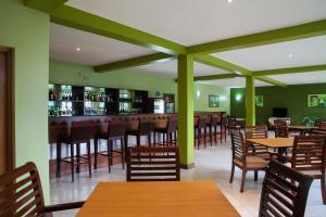 A restaurant or other place to eat at Gorillas Lake Kivu Hotel