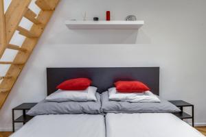 A bed or beds in a room at Little Cola apartment in Dohány street with AC