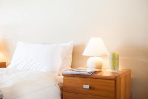 Ένα ή περισσότερα κρεβάτια σε δωμάτιο στο Niseko Alpine Apartments