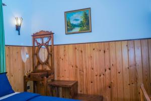 Postel nebo postele na pokoji v ubytování Blue Moon Residency