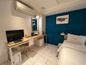 TV a/nebo společenská místnost v ubytování Hotel Yaja Hwajeong Station