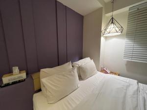 Postel nebo postele na pokoji v ubytování Hotel Yaja Hwajeong Station