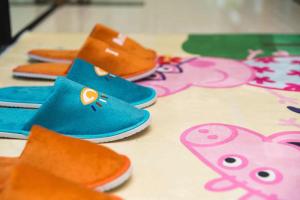 a group of shoes sitting on a table at Hotel Indigo Xiamen Harbour, an IHG Hotel in Xiamen