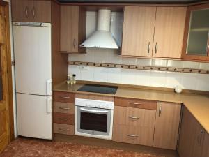 A kitchen or kitchenette at CARLA 24