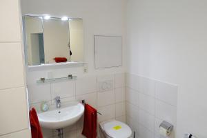 Koupelna v ubytování cozy 3 room Apartment
