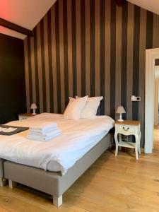 Postel nebo postele na pokoji v ubytování Hotel Vorsen