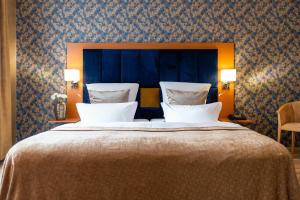 Postel nebo postele na pokoji v ubytování Parkhotel Görlitz